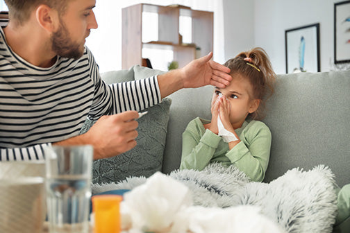 Parent and child sneezing